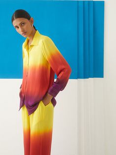 VALUES Handcrafted Organic Fair Minimal Waste Traditional CURATOR'S NOTE Make a statement with this trans seasonal piece- The Sunrise Tie & Dye Co-ord is crafted from stunning vegan silk fabrication. Made in three elegant colours in an ombré design, this set is a trend setting piece. With a straight shirt and casual fit straight trousers, the set has an interplay of colours with bead and hand hem thread detail. Matched with straight trousers which have a front opening and pockets. Pair it will h Elegant Colours, Yellow Pants, Purple Tie Dye, Purple Tie, The Sunrise, Tie And Dye, Straight Trousers, Dye Shirt, Tie Dye Shirt