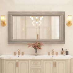 a bathroom vanity with two sinks and a large mirror