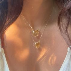 Beautiful AAA Large Citrine Heart Necklaces. 24k gold plated around the edges of the pendant so you can soak in the citrine energy through your skin Choose from 16 or 18 length! Chains are gold fill. Citrine attracts wealth, prosperity and success. It imparts joy, wonder, delight and enthusiasm. Raises self-esteem and self-confidence. Stimulates the brain, strengthening the intellect. Citrine promotes motivation, activates creativity and encourages self-expression Heart Gold Necklace, Heart Necklaces, Citrine Jewelry, Citrine Necklace, Gold Heart Necklace, Citrine Crystal, Cleaning Jewelry, Crystals And Gemstones, Self Esteem