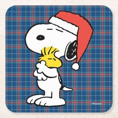 snoopy with santa hat on his head drinking beverage coasters