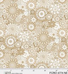 a beige and white flower pattern on fabric with a ruler in front of the image