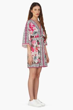 Cover up kaftan dress with border panel Short cover up dress Extended loose sleeves Waist elastic at front and back Embrace the spirit of summer with the Flamingo Paradise Short Kaftan Dress. It is a breezy and vibrant piece that captures the essence of tropical paradise. This short kaftan dress features a cover-up design with a border panel, adding a pop of color and visual interest to the garment. The extended loose sleeves provide a relaxed and airy feel, perfect for lounging by the pool or s Short Kaftan Dress, Short Kaftan, Leopard Bag, Loose Sleeves, Kaftan Dress, Bag Dress, Tropical Paradise, Cover Up Dress, Skirt Pants