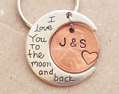 i love you to the moon and back keychain with personalized coin on it