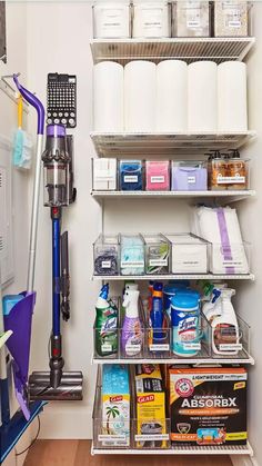 the inside of a closet with cleaning products and supplies on shelving unit, labeled clean