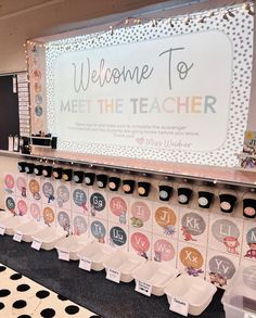 there is a sign that says welcome to meet the teacher