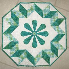 Spin the Wheel quilted wall hanging pattern with applique in the center easy to make Stars Table Topper, Knitted Heart Pattern, Table Topper Patterns, Spin The Wheel, Mini Quilt Patterns, Mug Rug Patterns, Wine Bottle Diy Crafts, Pdf Quilt Pattern, Patchwork Quilt Patterns