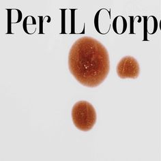 the cover of per ill corppe, with three orange circles in front of it