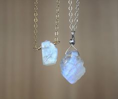 "SIZE XS and S are currently on sale at a separate listing. https://www.etsy.com/ThreeMagicGenies/listing/830987448/petite-raw-moonstone-necklace-june?utm_source=Copy&utm_medium=ListingManager&utm_campaign=Share&utm_term=so.lmsm&share_time=1595783435581 - THIS LISTING IS FOR ONE NECKLACE. PHOTOS ARE ENLARGED. (Please refer to the last few photos for the actual size). - Made with AAA+ quality rough stone with rainbow or blue flash. All stones are carefully selected. - The stones a Gift Moonstone Necklace With Raw Stone, Moonstone Gemstone Crystal Necklace For Gift, Moonstone Jewelry With Raw Stone For Gift, Raw Moonstone Jewelry For A Gift, Raw Moonstone Jewelry As Gift, Moonstone Necklaces With Natural Stones For Gifts, Moonstone Necklace With Natural Stones For Gift, White Crystal Necklace With Moon Charm Gift, White Mystical Crystal Necklace Gift