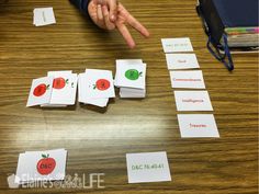 an apple matching game is shown on the table