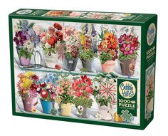 the puzzle box is filled with flowers and potted plants on display in front of a white background