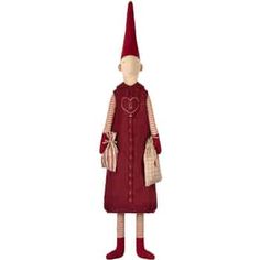 a wooden doll with a red dress and hat on it's head, standing in front of a white background