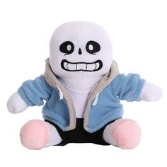 a white stuffed animal with black eyes and a blue shirt on it's chest