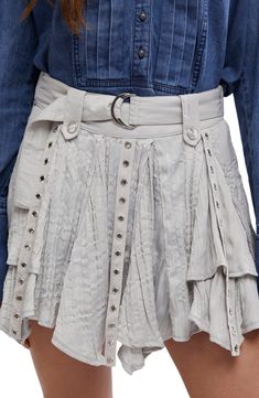 High-shine grommets amp up the edge of this flowy miniskirt punctuated with a swingy asymmetric hem. Ring belt 100% polyester Machine wash, line dry Imported Skirts Flowy, Ring Belt, Pumice Stone, Free People Skirt, Asymmetrical Skirt, Asymmetric Hem, The Edge, Midi Skirt, Free People