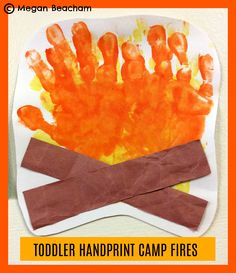 a paper plate with an orange handprint on it and the words toddler handprint camp fires