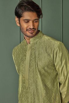 Olive green chanderi kurta with all over floral jaal pattern and tonal resham embroidery. Paired with contrast pyjama. - Aza Fashions Green Jamawar Kurta With Resham Embroidery, Green Resham Embroidered Jamawar Kurta, Green Embroidered Kurta For Diwali, Green Embroidered Chanderi Bandhgala, Green Lawn Suit With Intricate Embroidery For Diwali, Transitional Green Traditional Wear With Intricate Embroidery, Green Kurta With Intricate Embroidery For Festivals, Green Straight Kurta With Intricate Embroidery, Semi-stitched Green Chanderi Sherwani