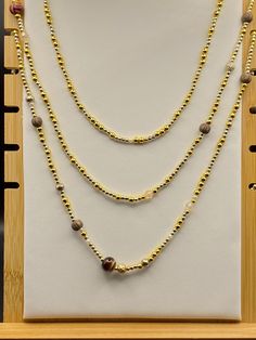 A unique Gold, Silver, Pearl, and Wooden Beaded set consisting of a necklace and pants chain. You can buy one or the other or but both as a set. They are super cute together and are a great accent to an outfit. **LOCAL PICKUP OFFERED** I offer local pickup; as well as standard shipping. Please reach out (before you pay) if you plan to pick up your item/s; as I have a code for FREE SHIPPING for local pickup ONLY. Thank you and happy shopping! Trendy Gold Beaded Layered Necklace, Trendy Gold Long Beaded Necklaces, Trendy Long Gold Beaded Necklaces, Pants Chain, Beaver Falls, Pant Chains, Silver Pearls, Silver Gold, Happy Shopping