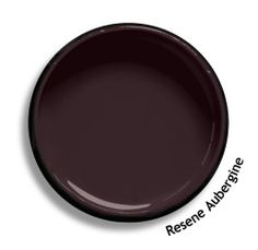 a dark brown plate with the words renre adore written on it in black