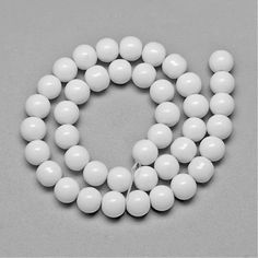 "1 Strand, 8mm, Glass Beads Strands, Round in color White for Jewelry Making Diy Bracelet & Necklace. Size: 8mm Hole: 1mm; Quantity of Beads: approximately 40pcs/strand Strand Length: approximately 11\"~12\" Material:Glass Color:White Shape:Round Usage:Beads Item Quantity: 1 strand/ pack For other Glass Beads, please visit: https://www.etsy.com/shop/MostValuablePieces?search_query=glass+beads For more of our shop beads and gemstones options, please visit the links below: https://www.etsy.com Beads Wholesale, Delica Beads, Polymer Clay Beads, Jade Beads, Wholesale Beads, Agate Beads, White Beads, Bead Strand, Clay Beads