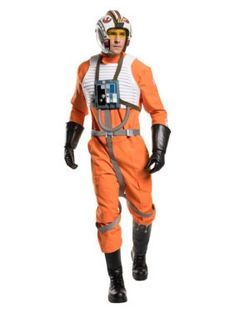 a man in an orange space suit and helmet is walking with his hands on his hips