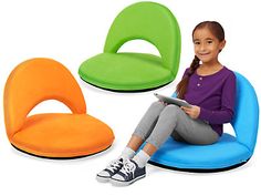 three children's chairs and one child's chair with a tablet on it