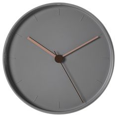 a clock that is on the side of a wall with two hands and an hour