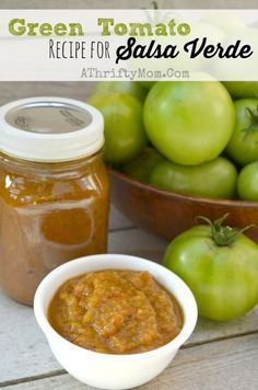 green tomato sauce in a small bowl next to some tomatoes