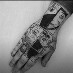 a person's hand with some tattoos on it