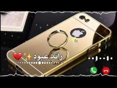 an image of a gold phone with arabic writing on the front and back cover,