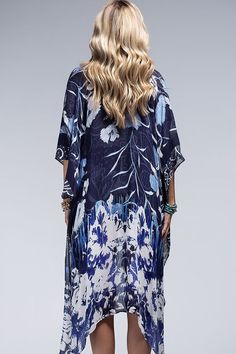 This kimono has a stunning all over floral print in a beautifull colorway! - 100% Viscose - 38"x40" - One size fits all Blue Floral Print V-neck Kimono, Patterned Kaftan For Spring, Multicolor Floral Print Kimono One Size, One Size Multicolor Floral Print Kimono, One Size Floral Print Kimono For Festivals, Blue Floral Print Kimono, Blue Floral Print Flowy Kimono, White Floral Print Kimono For Festival, Blue Rayon Kimono For Spring