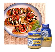 some food is sitting on a plate and next to a jar of garlic seasoning