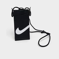 * Phone-sized crossbody with metal hardware and high-contrast Nike Swoosh logo   * Fully adjustable strap for personalized fit and optional styling   * Tech-touch screen for in-bag phone use   * 0.7"W x 7"H x 3.5"D   * 34% nylon/27% PU leather/15% thermoplastic polyurethane (TPU)/12% polyester/7% polyoxymethylene (POM)/5% zinc alloy   * Spot clean   * The Nike Premium Phone Crossbody Bag is imported.  When you're on-the-go and your phone is your sole priority, keep it protected in luxe Swoosh style when you wear this Nike Premium Phone Crossbody Bag. Running Sandals, Nike Swoosh Logo, Big Clothes, Swoosh Logo, Newest Jordans, Nike Swoosh, Kids Sale, High Contrast, Jd Sports