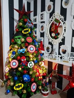 a decorated christmas tree in the corner of a room