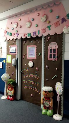 a bulletin board is decorated with pink and brown decorations