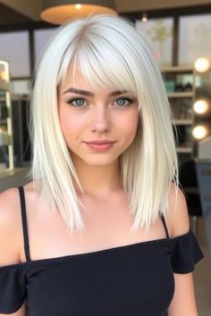 Elevate your style with this sleek, straight platinum lob! 💇‍♀️ The soft, wispy bangs add a touch of effortless charm, framing your face beautifully. Perfect for a modern, polished look with a hint of edge! 💁‍♀️💫 Lob With Fringe Straight Hair, Lob With Fringe Round Face, Short Haircut With Wispy Bangs, Lob With Bangs Round Face, Straight Lob With Bangs, Lob With Wispy Bangs, Platinum Lob, Lob With Fringe, Bob Hair With Bangs