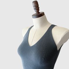 Elegant merino wool tank top. This soft and comfy tank top features a ribbed knit pattern that enhances the fabric's natural stretch and offers a figure-hugging fit. The v-neckline and wide shoulder straps provide a comfortable wear, while also giving it a contemporary edge. Professionally knitted. Features V-neckline, ideal for layering. Yarn Composition:100% Merino Wool Also available in 100% Cashmere option HERE. SIZING:Small/Medium: US size 4-8. Overall length: 21 inches. Measurements might Tank Top Women, Wool Clothing, Knit Pattern, Clothing Care, Cashmere Wool, Rib Cage, Lingerie Collection, Top Women, Wash Bags