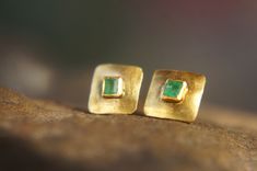 This lovely pair of gold and green emerald earrings Made of 2 mm green emerald (AAA quality) which have been set into a solid 22k yellow gold setting with a beautiful matte finish (can also be polished to a high luster finish) post is made with 20k gold. ear nut is 14k gold This is a one of a kind item These studs are wonderful as a gift, for someone you love, or for yourself. They are suitable for every occasion, for the day, or for the evening. Last forever and only gets more beautiful with ti Emerald Gold Earrings, Red Ruby Earrings, Green Emerald Earrings, Emerald Studs, 22k Gold Earrings, Ruby Earrings Studs, Emerald Green Earrings, Emerald Earrings Studs, Tiny Earrings