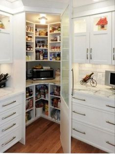 an open pantry with lots of food in it