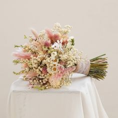 Pink Dried Flowers Bouquet For Wedding,Baby's Breath + Daisy Dried Flower Bridal Bouquet,Bohemian Wedding Dried Flowers S Size: 11-12" height, 4-5" overall width M size: 11-12" height, 6" overall width L Size: 12-13" height, 7-8" overall width XL Size: 13-14" height, 9-10" overall width Boutonniere 4-5" height Note: The picture only shows the bride bouquet ， Please carefully check the drop-down menu to select the item you need Provide customized bridesmaids, corsages,and arch etc. . . Please avo Thistle Bouquet Wedding, Bride Bouquet Pink, Dried Flower Bridal Bouquet, Wedding Dried Flowers, Ivory Rose Bouquet, Pink Dried Flowers, Wildflower Bridal Bouquets, Lavender Bridal Bouquet, Winter Bridal Bouquets