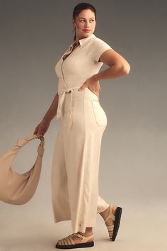 From the top-rated Colette collection, a true hit-single featuring a faux-wrap bodice, tailored wide-leg, and wear-anywhere appeal. | The Colette Wrap Jumpsuit by Maeve: Linen Edition in White, Women's, Size: 22W, Linen/Viscose/Elastane at Anthropologie Versatile Fitted V-neck Jumpsuit, Versatile Fitted V-neck Jumpsuits And Rompers, Chic Wide-leg Jumpsuits And Rompers For Loungewear, Fitted Wide Leg Jumpsuit Or Romper In Solid Color, Chic Wide Leg Jumpsuit With Tie Waist, Chic Wide Leg Jumpsuits And Rompers With Tie Waist, Fitted Wide Leg Jumpsuits For Loungewear, Versatile Wide Leg Jumpsuit Or Romper, Fitted Wide Leg Jumpsuits And Rompers With Belt