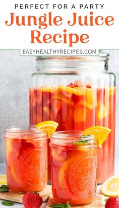 two mason jars filled with fruity juice and garnished with lemons, strawberries, and mint