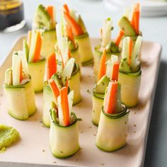 cucumbers with carrots and celery on a tray