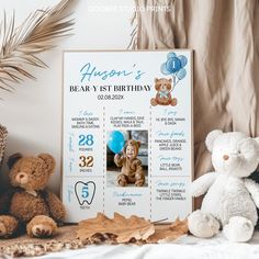 a teddy bear sitting on top of a bed next to a birthday card and two stuffed animals