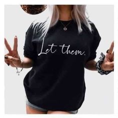 Haters inspired top that means LET THEM talk, let them judge, don't Let it affect YOU! Available in a sweatshirt or t-shirt, in black or white. Please choose the correct style and size when checking out. Oversized Black T-shirt With Lettering, Trendy Black Tops With Lettering, Trendy Black Top With Lettering, Black Casual Tops With Lettering, Casual Black Tops With Lettering, Casual Streetwear Tops With Lettering, Black Casual T-shirt With Lettering, Casual Tops With Lettering For Streetwear, Black Cotton Tops With Lettering