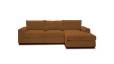 a brown sectional couch sitting on top of a white floor