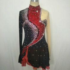 a black and red dress with sequins on it