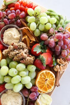 a platter filled with fruits and vegetables