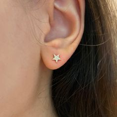 Fun star diamond studs in 14kt gold. These earrings are set with mini diamonds to give off the ultimate sparkle! Wear them on their own, or pair with our other huggies and studs for a fun ear stack. Diamonds (0.06 ct) 14k yellow, rose, or white gold Dimensions: 6mm Please allow up to 6 week for production. Sparkling Yellow Gold Diamond Earrings Gift, Sparkling Diamond Star Earrings, 14k White Gold Star Earrings, Sparkling Star-shaped Diamond Earrings, Yellow Gold Cubic Zirconia Star Earrings, 14k Gold Star-shaped White Gold Earrings, Yellow Gold Star-shaped Cubic Zirconia Earrings, Yellow Gold Star Shaped Cubic Zirconia Earrings, Star-shaped Diamond Earrings With Prong Setting