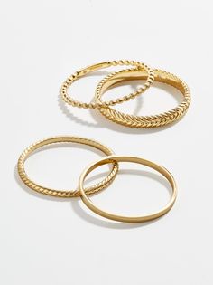 The Mamie 18K Gold Ring Set makes ring stacking a breeze. We created four unique ring pieces, some classic and some with a trendy twist, for a ring set that will complete every outfit this season. Not to mention, they're crafted from 18K gold plated sterling silver for long-lasting wear. Stack Rings Gold, Gold Stacking Rings, Unique Bangle, Bangle Ring, Chunky Jewelry, Gold Ring Sets, Gold Ring Stack, 18k Gold Ring, Prime Time