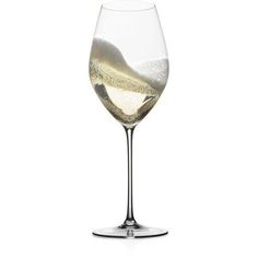 a wine glass filled with water and ice