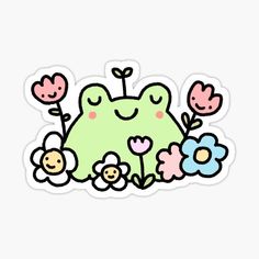 a sticker with an image of a green frog surrounded by flowers and smiling faces